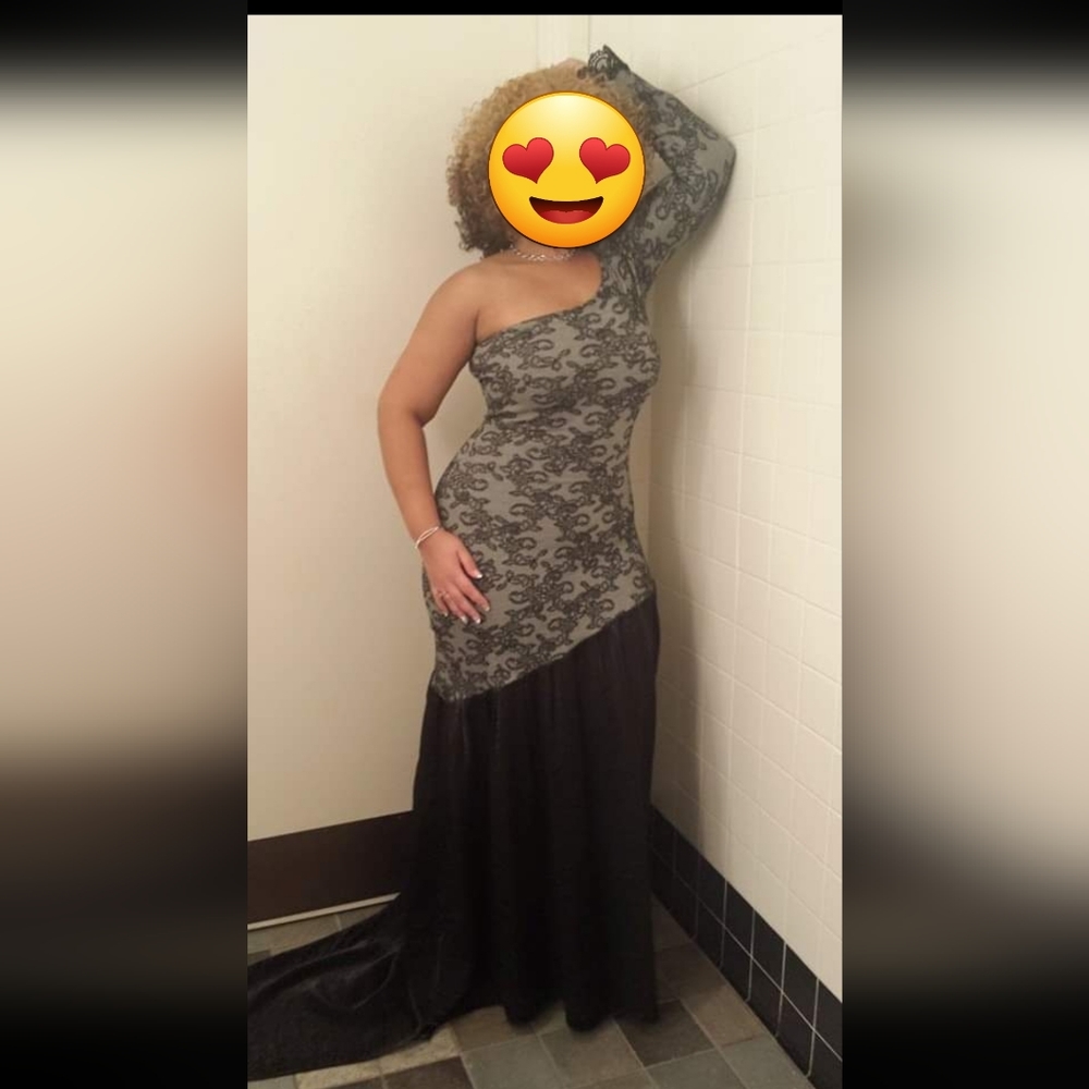 Custom made formal gown. Quality material made to fit like a glove.